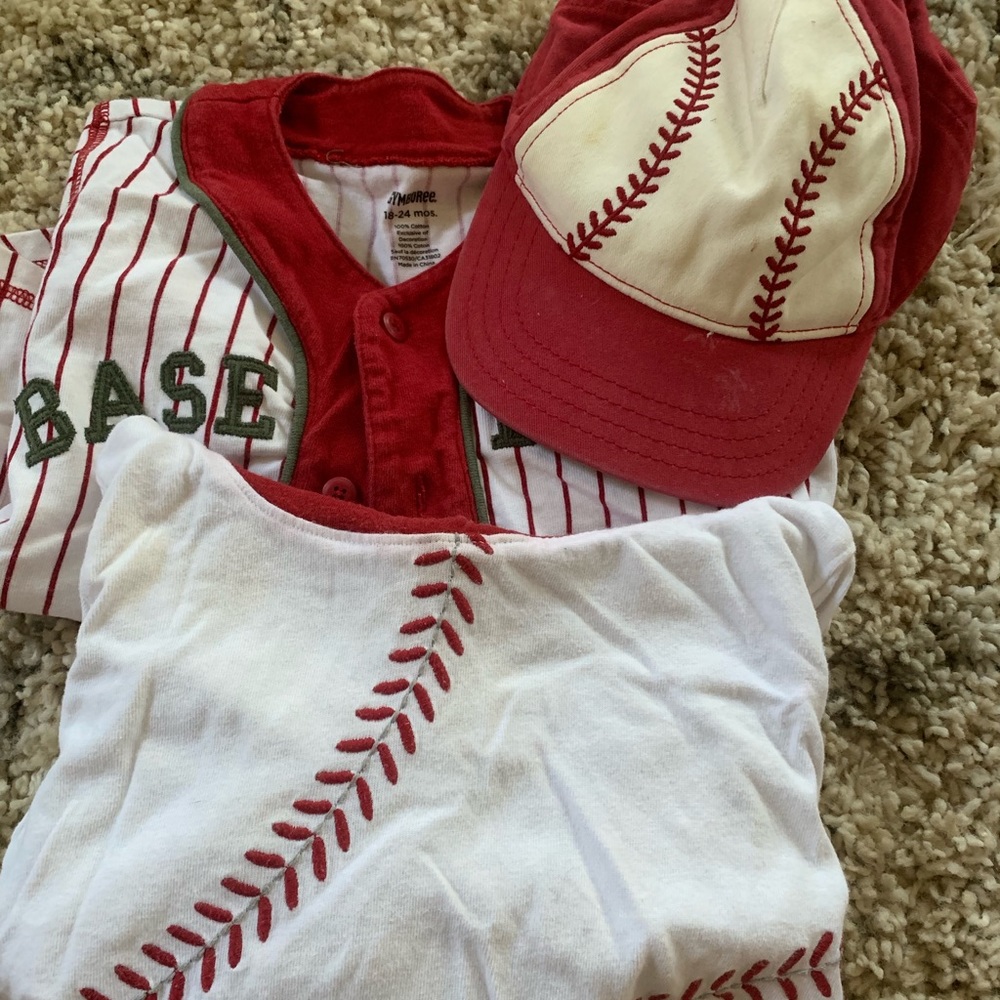 Two baseball long sleeve shirts and a matching mat